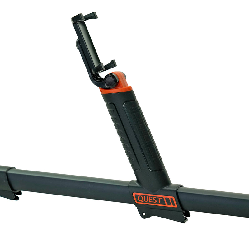 A close-up of a black and orange Quest metal detector mount with a phone holder attachment, shown on a white background.