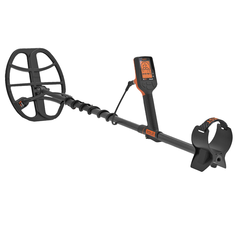 A black metal detector with an orange display screen and orange accents, shown on a solid white background.