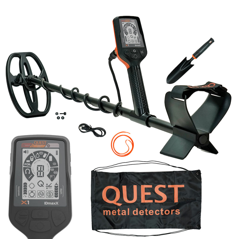 X! detector black and orange with accessories on a white background