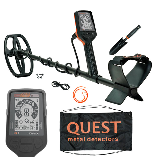 X! detector black and orange with accessories on a white background