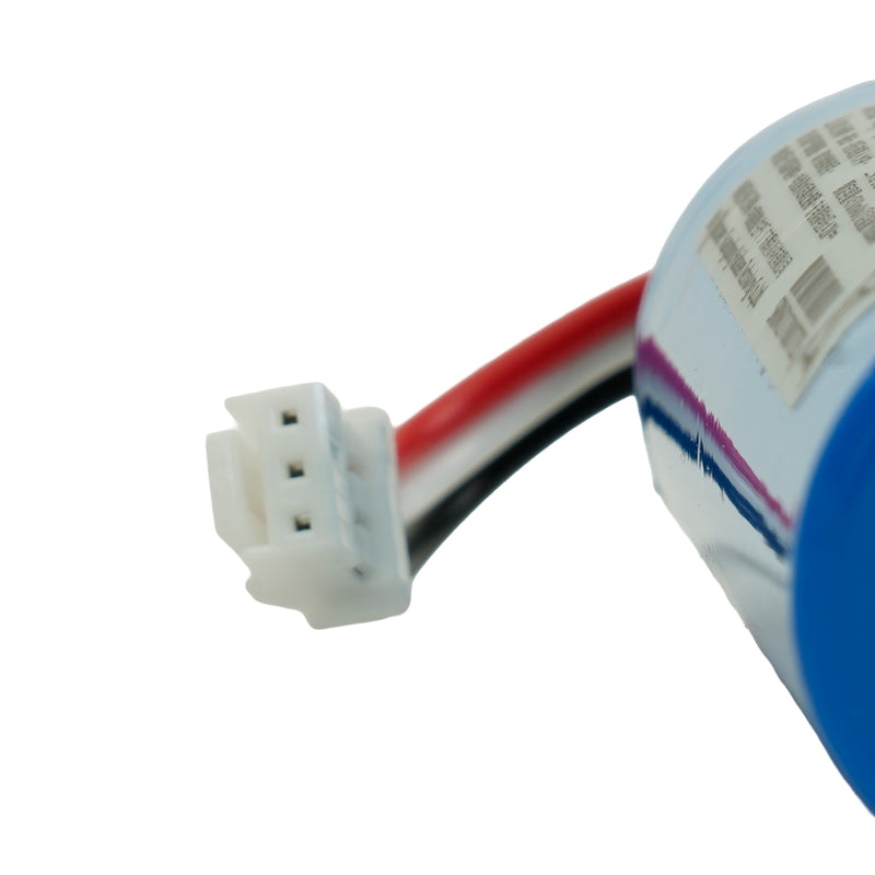 A close-up of a cylindrical electronic component with a white multi-pin connector, red and black wires, and a blue section on a white background.