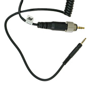 Black audio adapter cable with a 3.5mm plug and a threaded connector, featuring a coiled section and a small white brand tag.