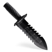 Black hand digger  with a serrated blade and measurement markings on a white background
