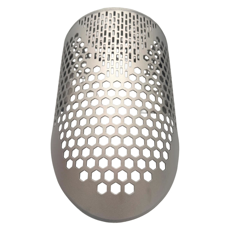 Scoop with a perforated hexagonal pattern, top view.
