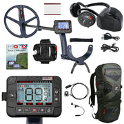 ICONX metal detector kit with a large coil, handheld controller, headphones, control cover, USB cable, charger, quick start guide, and a green/black backpack on a white background.